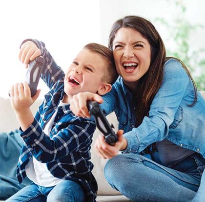 Mom and son using Marshall County Fiber internet.